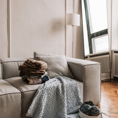 Meditation cushions stacked neatly in a corner